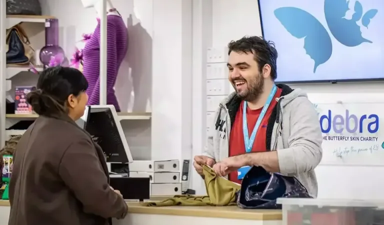 Volunteer in a DEBRA charity shop Mobile 960x640